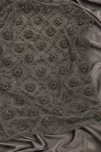 Blackish gray scattered unstitched material