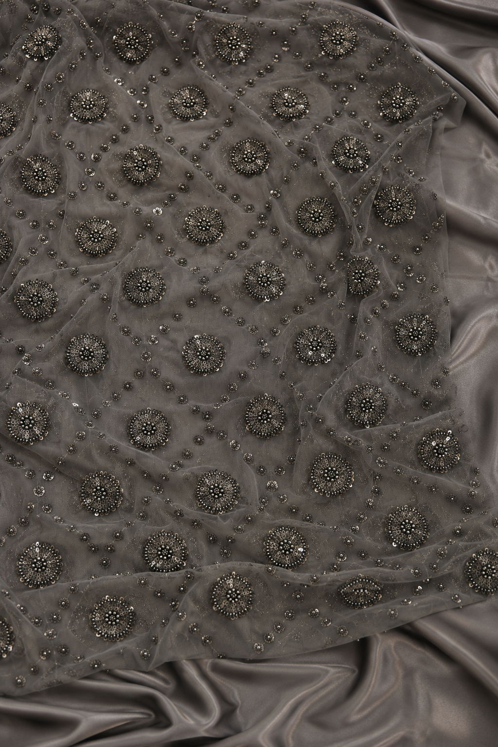 Blackish gray scattered unstitched material