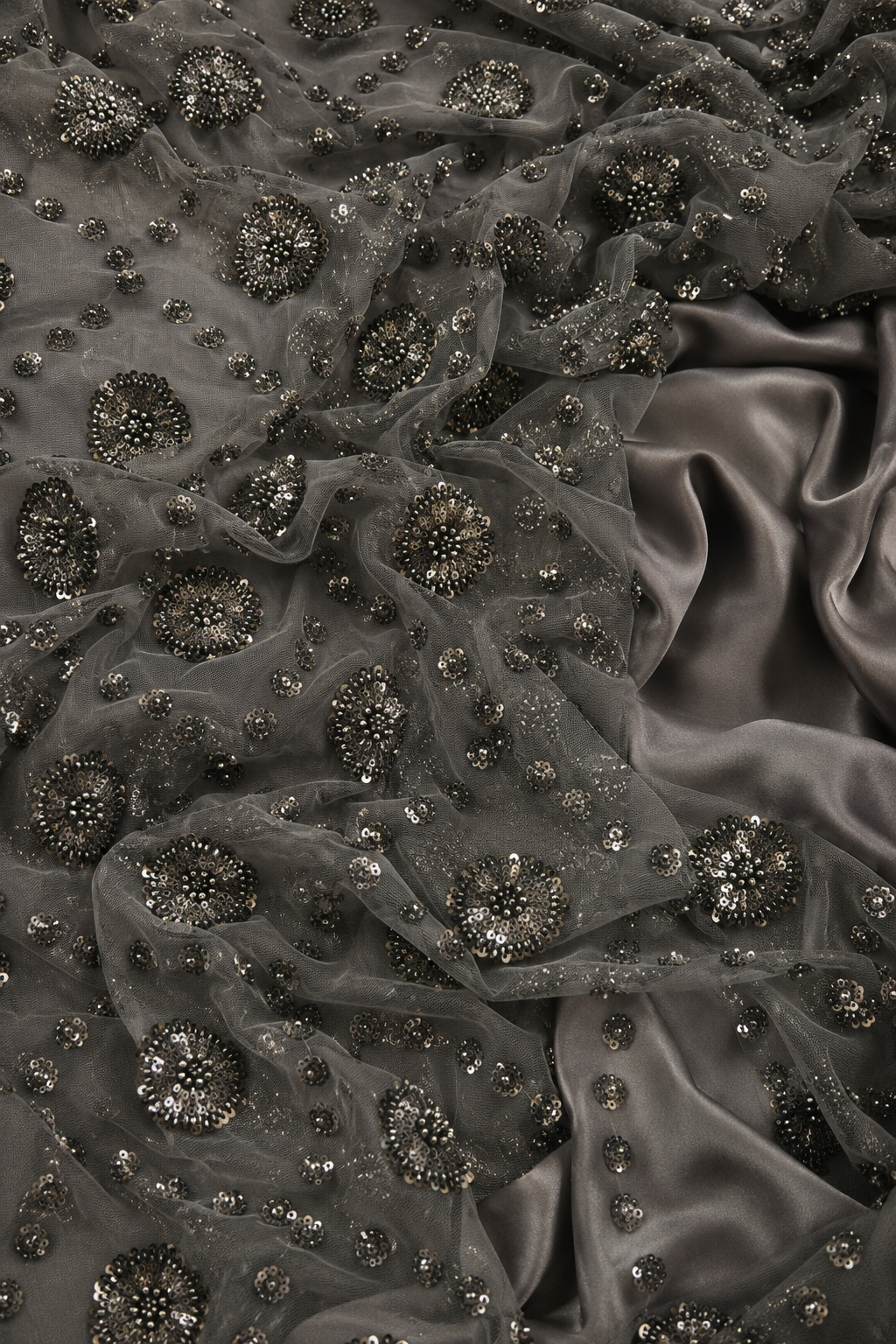 Blackish gray scattered unstitched material