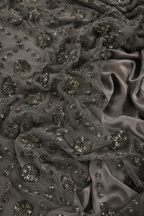 Blackish gray scattered unstitched material