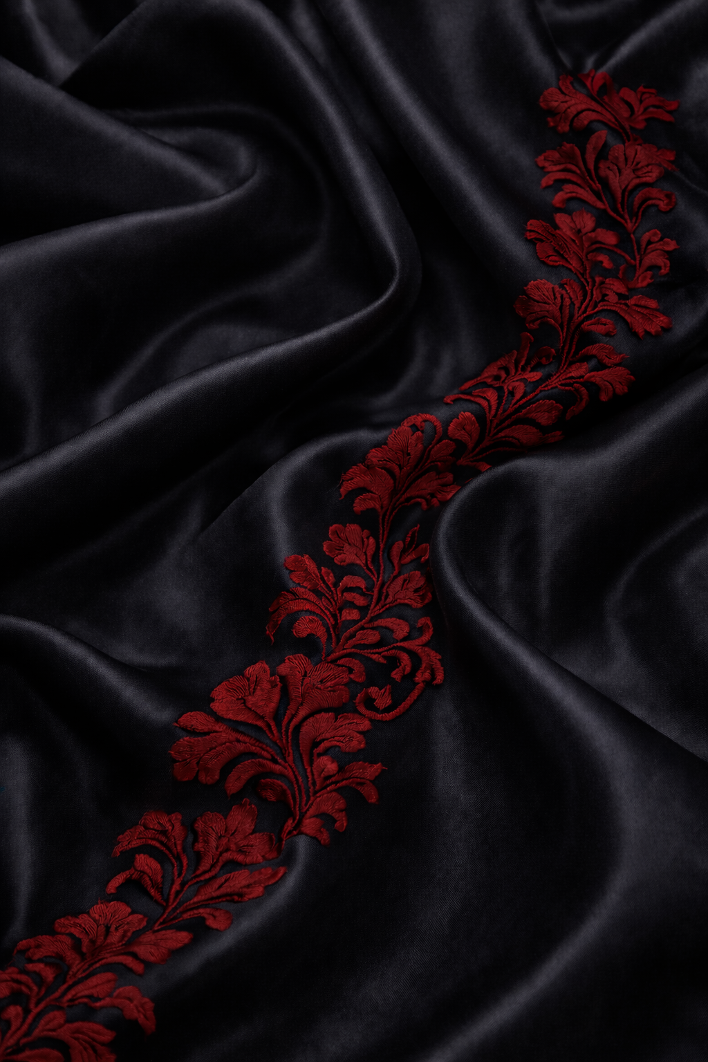 Black satin dress with red floral embroidery on the sleeves - Pre Order