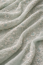 Mint green detached lace jacket with saree style gown. Floral embellishment and straight sleeves - Pre Order