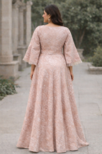 Blush pink Curve with floral design and funnel sleeves jacquard gown