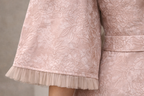Blush pink Curve with floral design and funnel sleeves jacquard gown