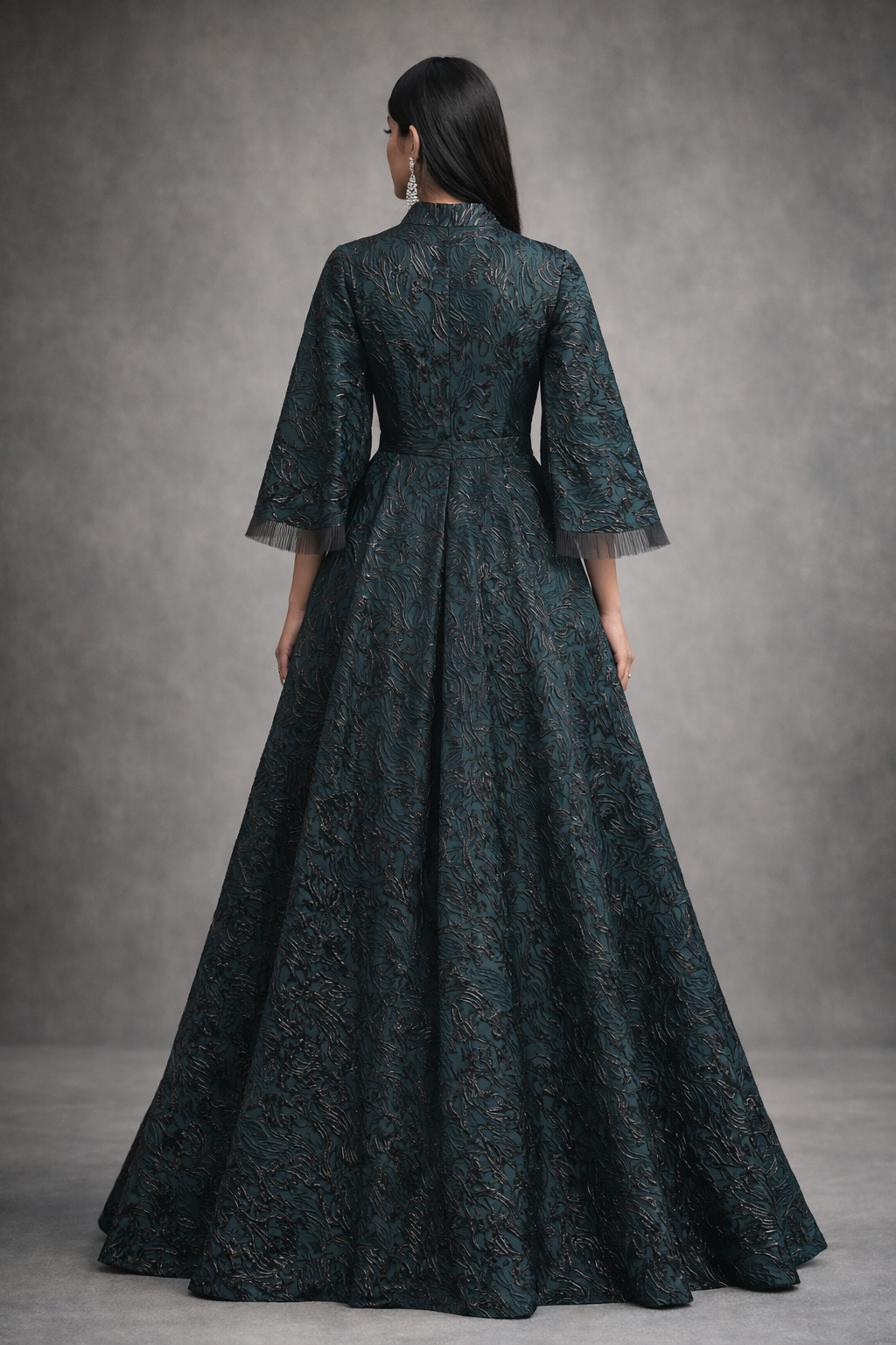 Green Jacquard gown with black accents and funnel sleeves
