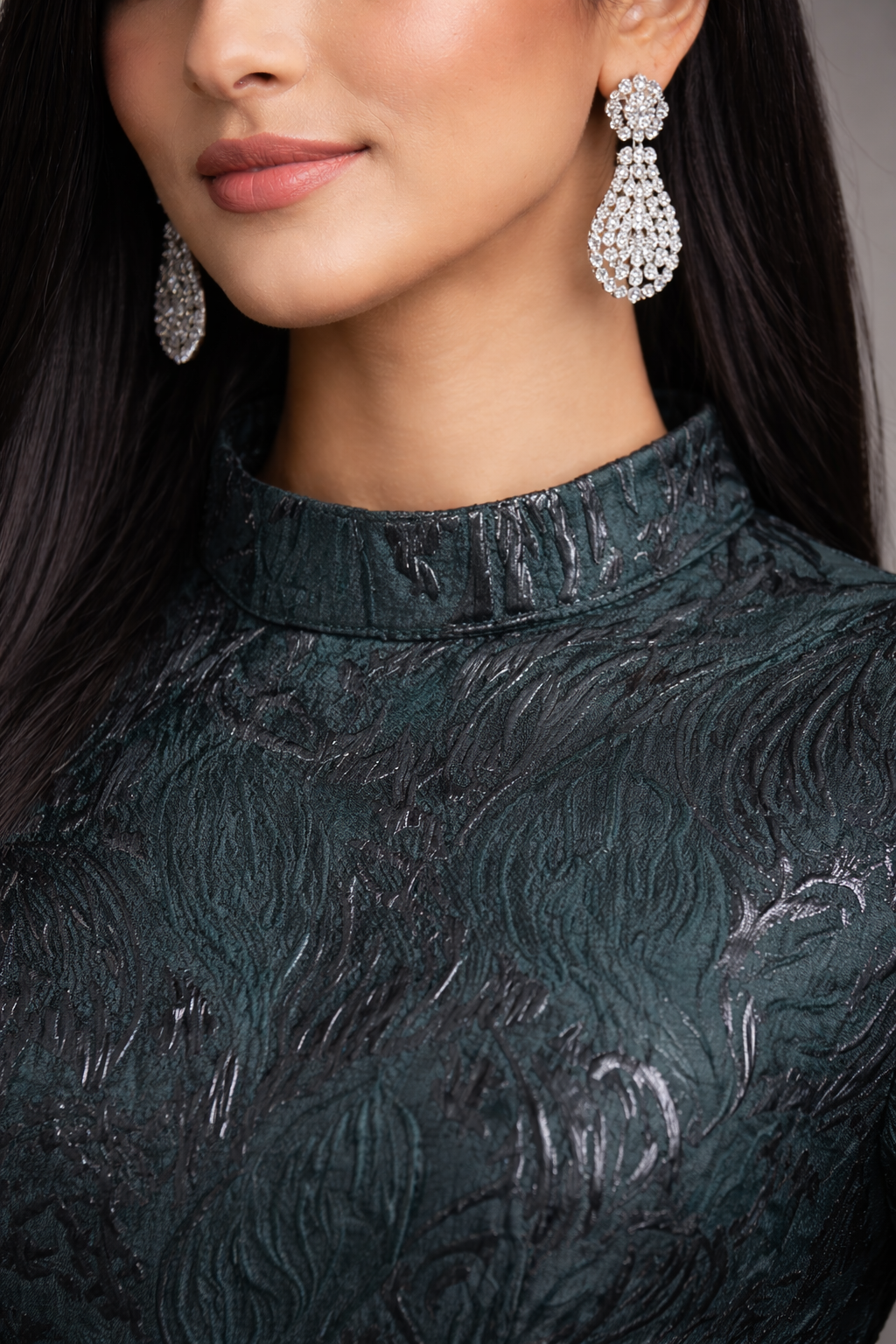 Green Jacquard gown with black accents and funnel sleeves