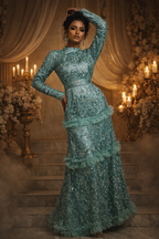 Lace Blue gown with rhinestores, net details on the skirt and straight sleeves