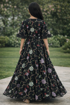 Kids black floral dress with funnel sleeves