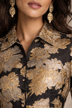Black with accents of gold and silver Jacquard asymmetrical jacket with straight pants and bell sleeves