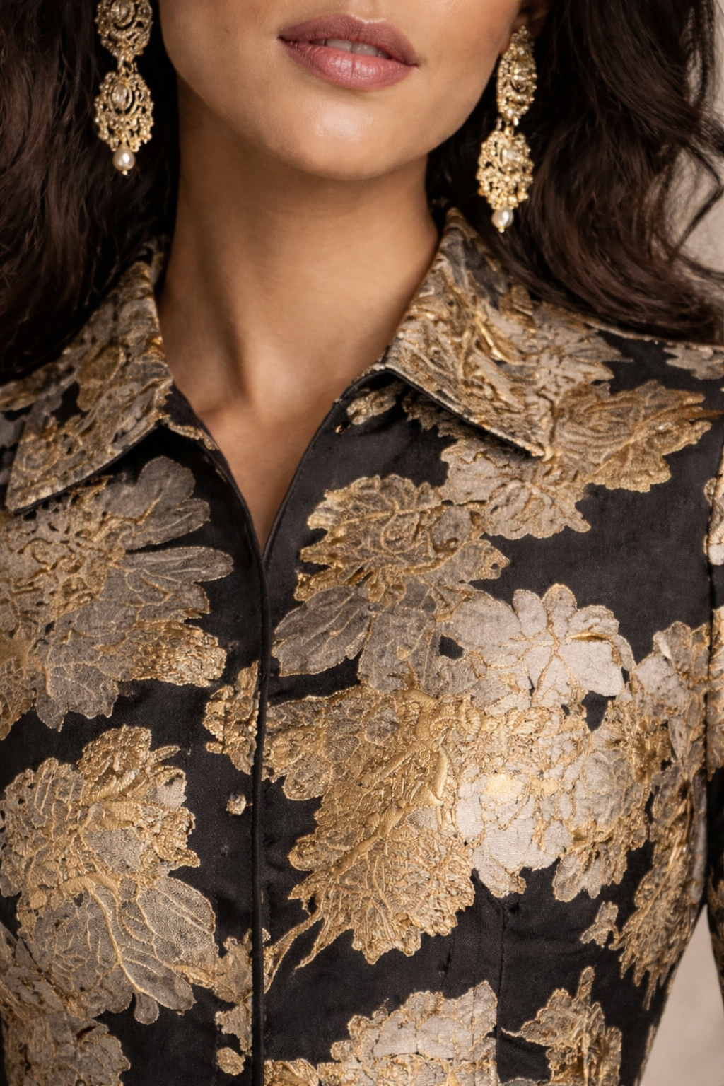 Black with accents of gold and silver Jacquard asymmetrical jacket with straight pants and bell sleeves
