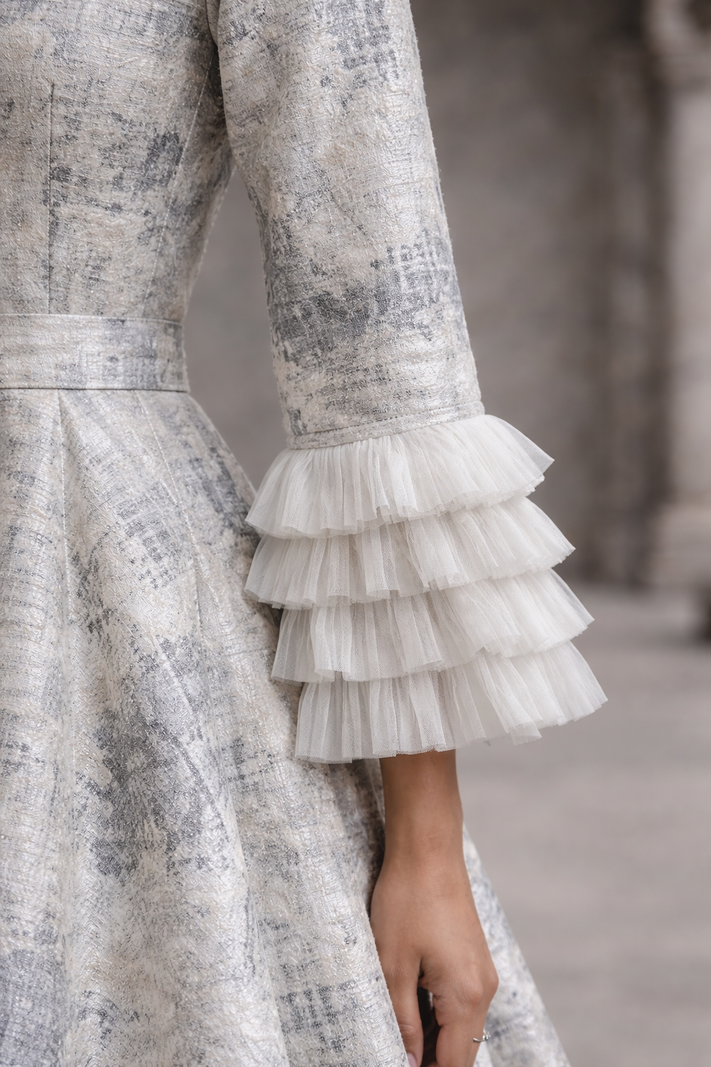 White with gray jacquard gown with a hint of silver with straight Ruffled sleeves