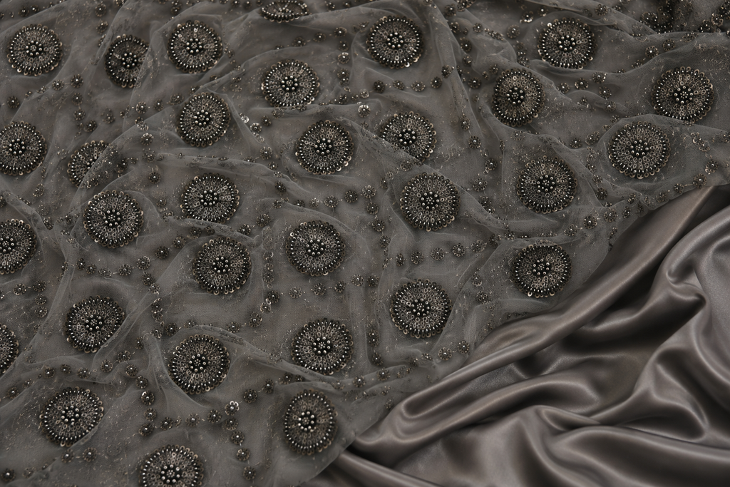 Blackish gray scattered unstitched material