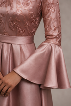 Pink satin gown with bell sleeves